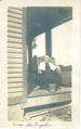 Alcesta Huntington sitting on her porch (circa 1910)